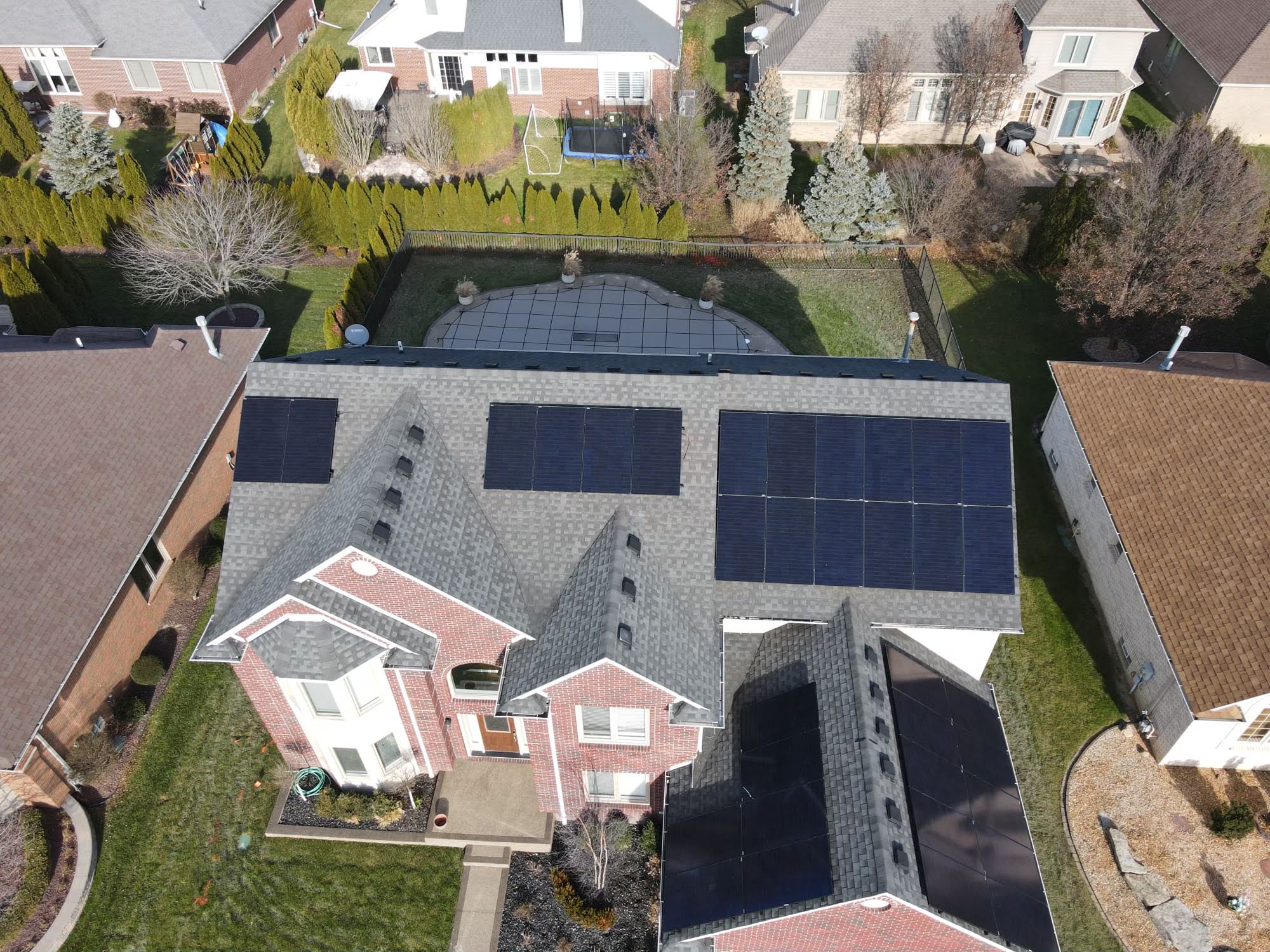 Sky view of home with solar panels